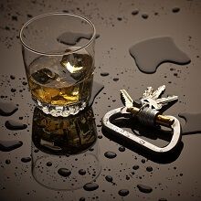 Alcohol and keys laying on a wet surface